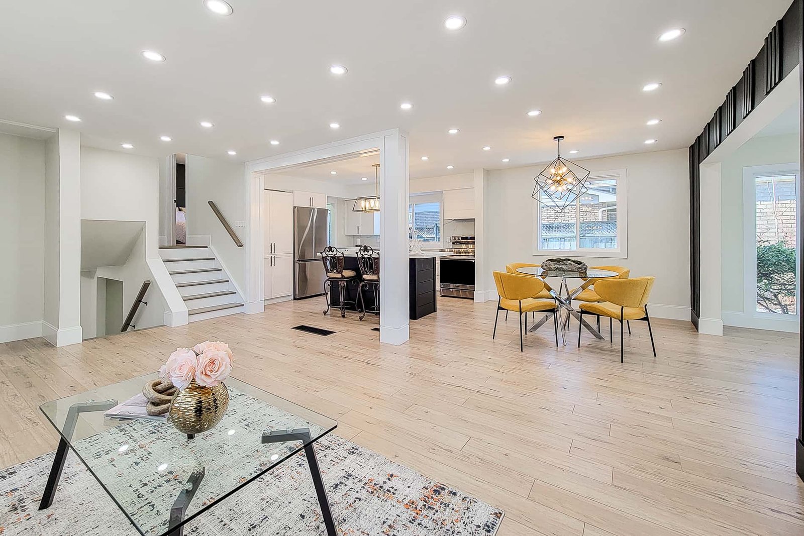 Wide-plank flooring, open main floor — Inoa Construction project